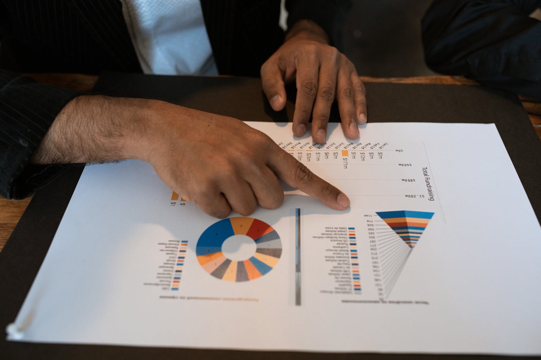 person holding white printer paper